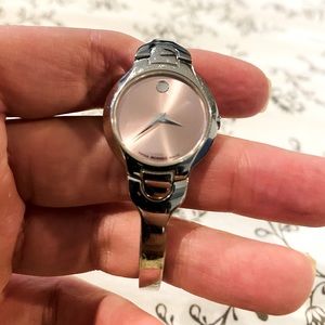 Movado pink bezel watch, new battery and extra links included